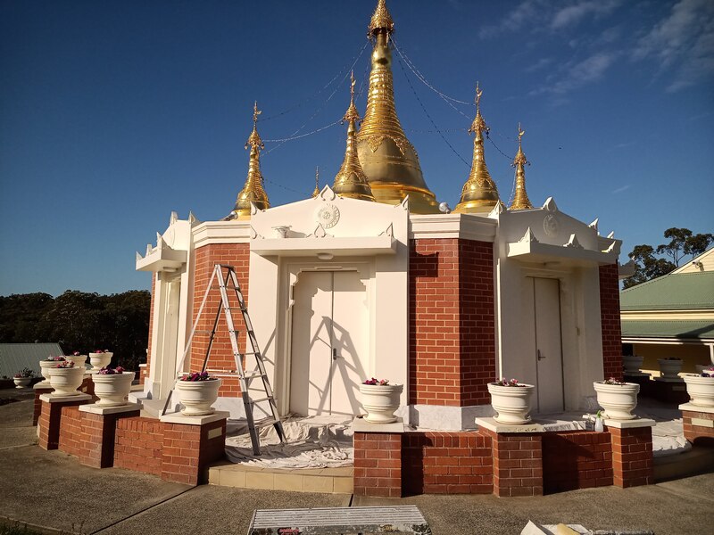 Exterior archetrave, doors and parapets newly painted on a pagoda, located at Sunshine, NSW. 