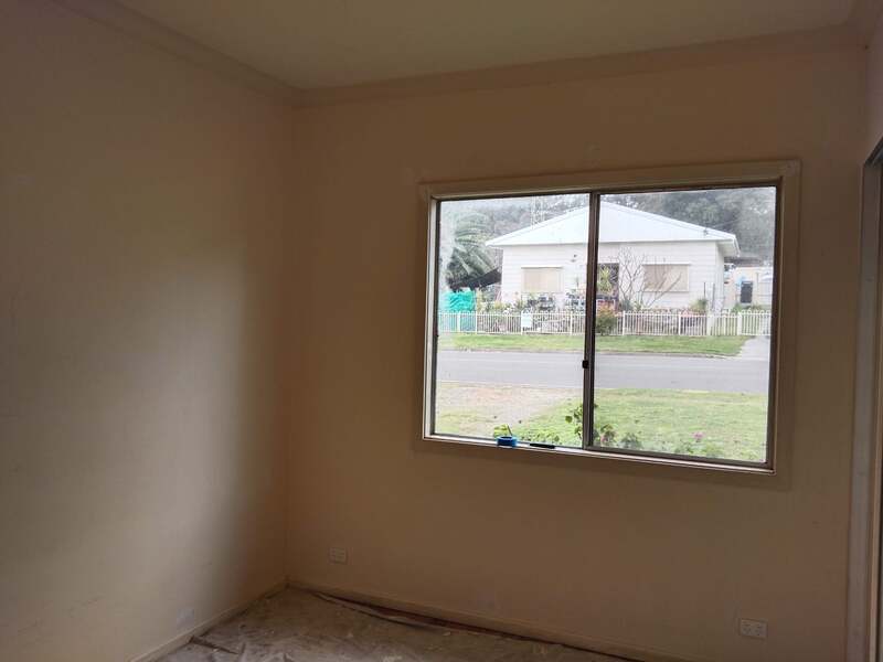 Bedroom of a house located at Cessnock. Room is unpainted. 